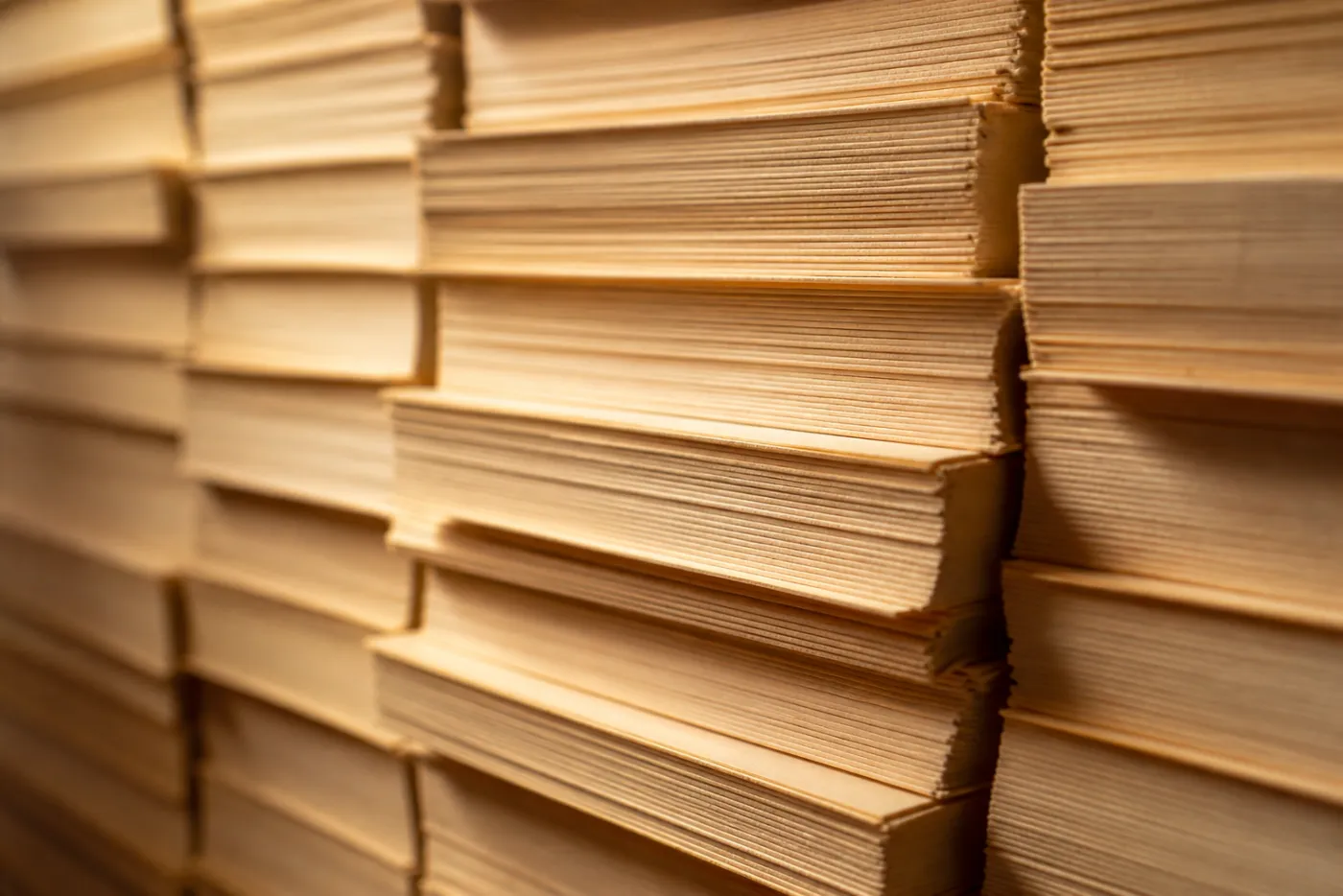A dense stack of blank cream index cards, photographed at the edges. Editorial photograph for this article; no individual is identified.